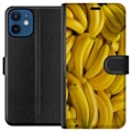 Miniatyrbild 1 av 3: Apple iPhone 12  Plånboksfodral Banana Pattern – lekfullt mönster med gula bananer