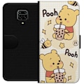Pikkukuva 1 / 3: Xiaomi Redmi Note 9S Lompakkokotelo Nalle Pooh - klassinen karhumotiivi uudessa tulkinnassa