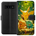 Miniatyrbillede 1 af 3: Samsung Galaxy S10 Tegnebogsetui Pixelmonster spillestil - farverig design til retro-elskende gamere