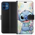 Kompatibelt Lommeboketui til Apple iPhone 12 Stitch holder en liten patchworkdukke blant pastellblomster og glitrende mønstre