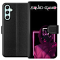 Miniatyrbillede 1 af 3: Samsung Galaxy A34 Tegnebogsetui Squid Game Tema Populær Serie Motiv Grafisk Ikonisk Design Asiatisk Popkultur Spænding Drama