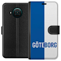 Pikkukuva 1 / 3: Nokia X10 Lompakkokotelo Göteborg - jalkapallo