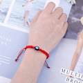 Miniatyrbilde 2 av 4: Justerbart armbånd, djevelens øye, rød tråd