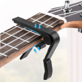 Miniatyrbild 3 av 4: Akustisk Elektrisk Gitarr Capo Folk Ukulele Basgitarr Aluminium Legering med 5 Gitarrspelare