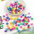 Miniatyrbillede 2 af 5: (B)100 bløde keramiske perler blandet med frugt og tegneserie perforeret