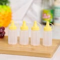 Miniatyrbillede 1 af 5: Fire gule trykflasker, 30 milliliter tryksauce
