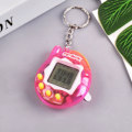 Miniatyrbillede 2 af 2: Elektronisk kæledyrsmaskine håndholdt mini virtuelt kæledyrstræningsspilmaskine nyt unikt legetøjsvedhæng nøglering pink transparent