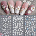 Miniatyrbild 1 av 5: Blomster Nagelsticker Dekaler 5D Ihålig Utsökt Mönster Nagelkonst Tillbehör Självhäftande Lyxig Nagelkonst Dekoration Vit Fjäder Spets Blomma Löv