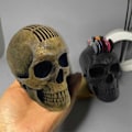 Miniatyrbild 3 av 5: Gotisk Realistisk Gitarrplektrumhållare i Form av en Dödskalle för Gitarr och Bas