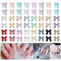 Miniatyrbild 1 av 5: 100 st Nageldekoration Kit 3D Aurora Rosett Nagelberlocker Färgglada Nageltillbehör med Rosett Vackra Resin Rhinestones för Nagelkonst Hantverk och Dekoration