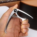 Miniatyrbild 4 av 5: Metallgitarrcapo för akustisk/elektrisk/klassisk triggerbyte B