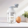 Miniatyrbilde 4 av 4: Eggtrekker Gull Egg Maker Bærbar Håndholdt Multifunksjonell Aureate Egg Lagingsverktøy Eggplomme Rister