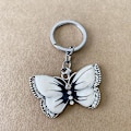 Miniatyrbillede 4 af 5: Nøglering til Piger Kvinder Butterfly Nøglering Krystal Butterfly Vedhæng Nøglering Nøglering Charm Bil Taske Tegnebog Hængende White