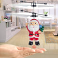 Miniatyrbillede 5 af 6: Julemanden svæver induktion flyvemaskine fe gestus induktion lysende børnelegetøj