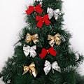 Miniatyrbillede 4 af 4: 12 små juletræspynt i form af sølvrosetter