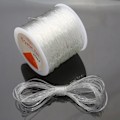 Miniatyrbillede 4 af 5: Elastisk tråd til armbånd 100m*0,8mm Elastisk armbåndssnor Elastisk stretchtråd Transparent Sort Transparent med saks og perlenål