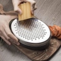 Miniatyrbillede 4 af 5: Ostriv med beholder 2-sidet citronskal i rustfrit stål Køkken Grøntsagshakker Mandoliner Skæremaskine Gulerodsriver Rivjernkasse (1 stk, sort) zdq