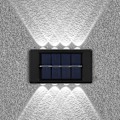 Miniatyrbillede 5 af 5: Solar væglampe udendørs vandtæt op og ned lysende lys i 10led varm hvid 1 stk