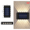 Miniatyrbillede 1 af 5: Solar væglampe udendørs vandtæt op og ned lysende lys i 10led varm hvid 1 stk