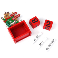 Miniatyrbilde 5 av 5: Tre julekalender ornamenter i tre
