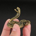 Pikkukuva 5 / 5: Antiikkimessinkivärinen kobrakuparinen heiluri hallitseva python