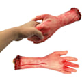 Pikkukuva 2 / 4: Prosthetic arms, bloody human hands and fingers, corpse fragment
