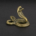 Pikkukuva 2 / 5: Antiikkimessinkivärinen kobrakuparinen heiluri hallitseva python