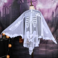 Pikkukuva 4 / 5: Valkoinen pitsi luuranko poncho, Halloween poncho Halloween asut