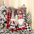 Miniatyrbild 2 av 5: Jultomtens strumpor i svenskt rött rutigt tyg