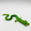 Miniatyrbillede 1 af 3: 3D-printet Himmelsdragen Stativ Pops Samme Dragemodel Led Fleksibel Bevægelig Model Børnelegetøj Ornamenter Fidget Legetøj