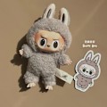 Miniatyrbilde 1 av 5: Labubu Macaron Monster Nøkkelring Spennende Macaron Monster Vinyl Ansikt Plysj Nøkkelring Kunst Samleobjekt Leke Barnegave-WELLNGS Sesame seeds