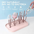 Miniatyrbillede 3 af 5: Pladsbesparende flaskeholder med kaktus-inspireret design og base - Holder flere flasker (Pink)