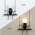 Miniatyrbilde 4 av 5: Innendørs vegglampe, kreativ humanoid sving vegglampe,