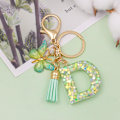Miniatyrbillede 3 af 4: Mode Alphabet Initial Bogstav Nøglering Tassel Butterfly Vedhæng Nøglering til Pung Håndtasker Kvinder Pige Green Butterfly Letter D