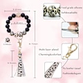 Miniatyrbillede 2 af 6: Silikonperle Armbånd Nøglering Håndledsrem Nøglering Bangle Kæder til Kvinder med Læder Kvast Leopard