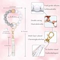 Miniatyrbillede 2 af 6: Silikonperle Armbånd Nøglering Håndledsrem Nøglering Bangle Kæder til Kvinder med Læder Kvast Marble