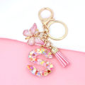 Miniatyrbillede 3 af 6: Mode Alphabet Initial Bogstav Nøglering Tassel Butterfly Vedhæng Nøglering til Pung Håndtasker Kvinder Pige Pink Butterfly Letter S
