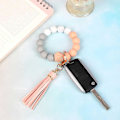 Miniatyrbillede 3 af 6: Silikonperle Armbånd Nøglering Håndledsrem Nøglering Bangle Kæder til Kvinder med Læder Kvast Peach