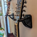 Miniatyrbild 3 av 3: Gitarr väggfäste/hållare/hängare Black 52