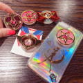 Miniatyrbilde 3 av 3: Anime Sailor Moon søte jenter telefonholder finger ring holder mobil