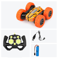 Pikkukuva 1 / 5: Kaksipuolinen tyhjennys Twist Car -kaukosäädin Kääntävä auton pyörivä leluauto (oranssi)