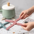 Miniatyrbild 5 av 5: Silikonunderlägg Halkfri hopfällbar designunderlägg för köksbord tål 220 grader 2 stycken,
