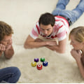 Pikkukuva 3 / 5: Korealainen perinteinen Gonggi-peli – Kivien heittopelisetti - Gonggi-kivien heittopeli Squid Game 2:n innoittamana (5 kpl + alusta) triangle