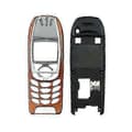 Komplet husdæksel (frontdæksel + midterramme) til Nokia 6310 / 6310i 2025 Orange