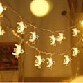 Miniatyrbillede 2 af 5: Silikon-fe-lys til ferieboliger Dekoration Stjerne og måne, varme farver. Star and moon, warm colors. 6 m40lights 3 battery packs