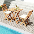 Miniatyrbillede 4 af 6: Have a seat at this costway dining table and two folding chairs for your garden. Made of acacia wood with soft cushions, featuring no armrests and re Naturlig