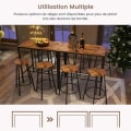 Miniatyrbillede 2 af 4: COSTWAY industrielt barbord med 4 taburetter, højt barbord med glasholder og flaskestativ under bordet Rustik brun