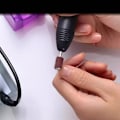 Miniatyrbilde 2 av 3: Elektrisk neglfil med 12 tilbehør for sliping/polering