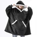 Oversized hettepledd, portabelt lammevelur, latmannspledd black
