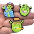 Pikkukuva 2 / 5: 10 kpl Shrek-aiheiset Crocs-kengänkorut Söpöt kengät Sandaalit Koristekorut Syntymäpäivälahjat Kengän lisävarusteet